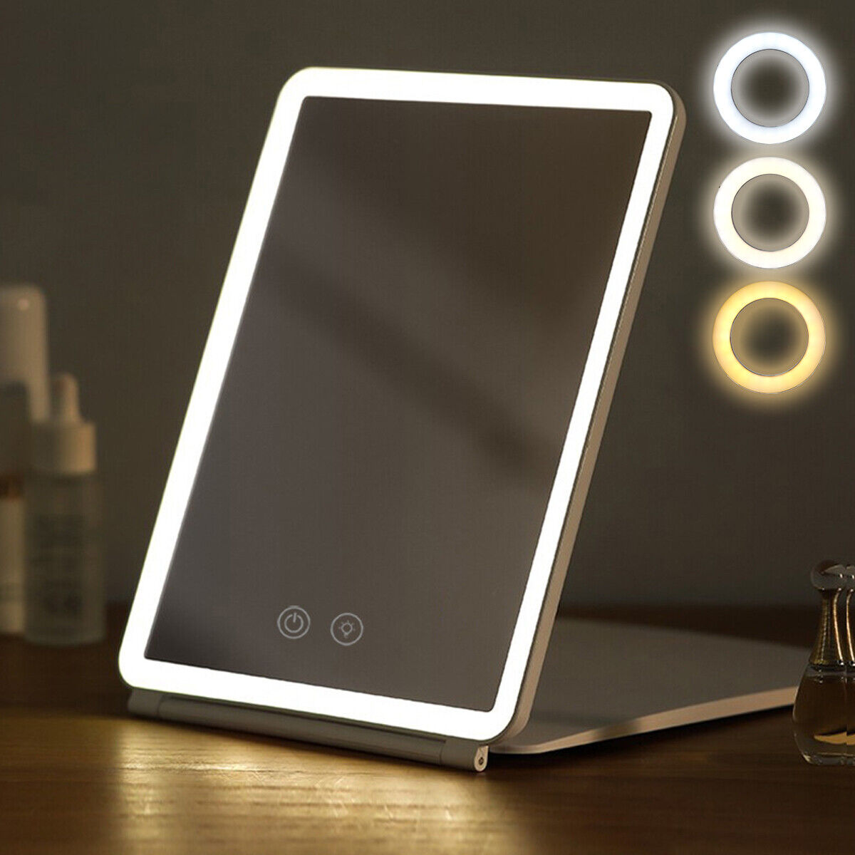 Folding makeup LED mirror with 80 bright LED lights and three color modes, shown on a tabletop.
